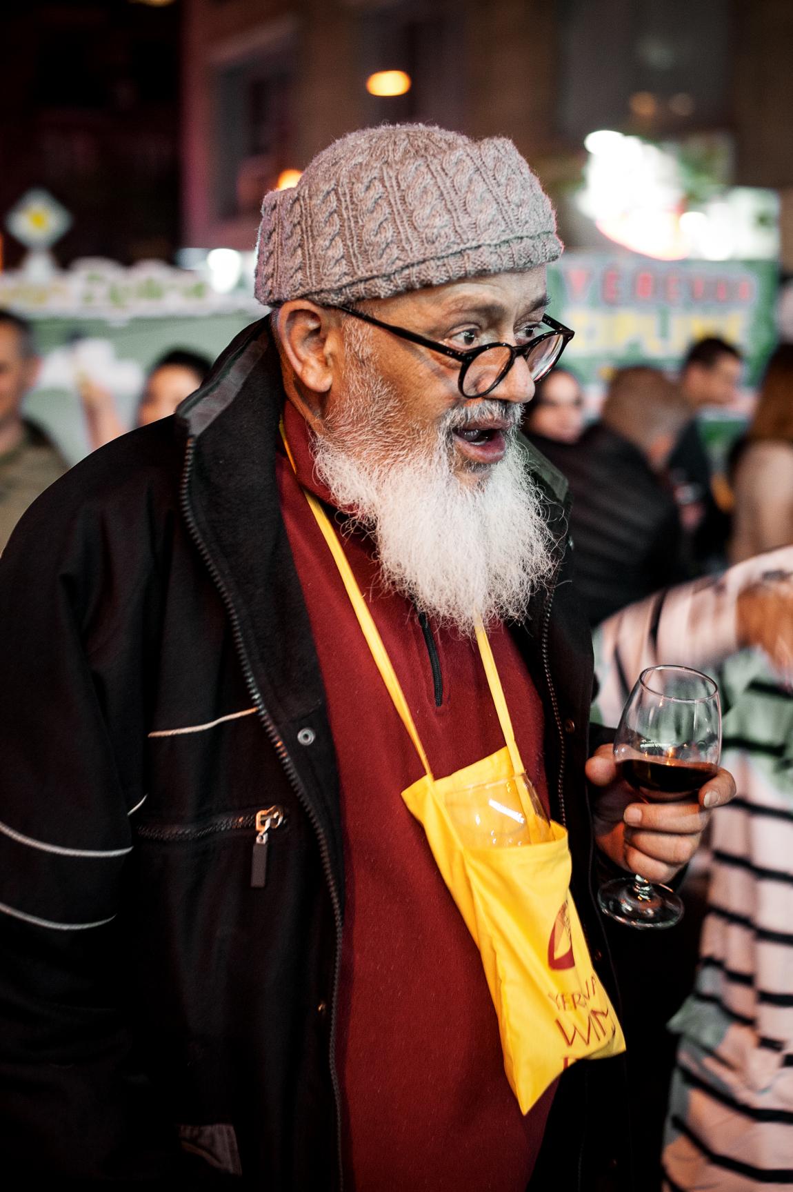 Man at the wine festival holding a glass